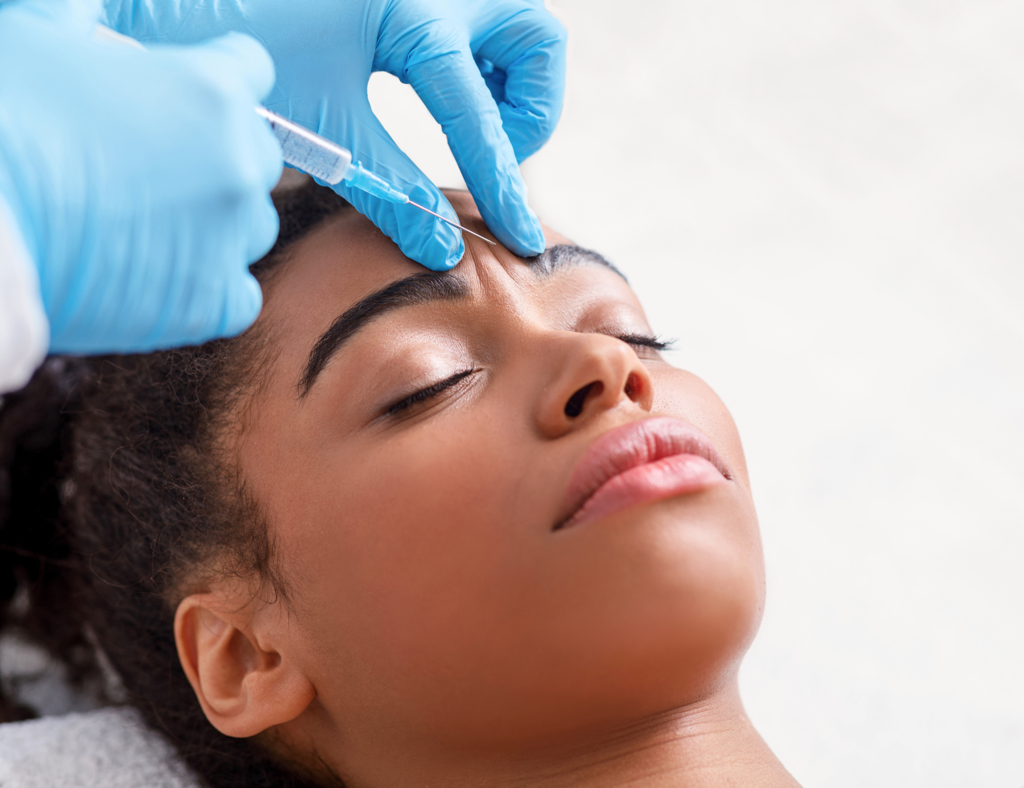 Woman relaxing in a med spa - U R Royalty - Cypress, TX